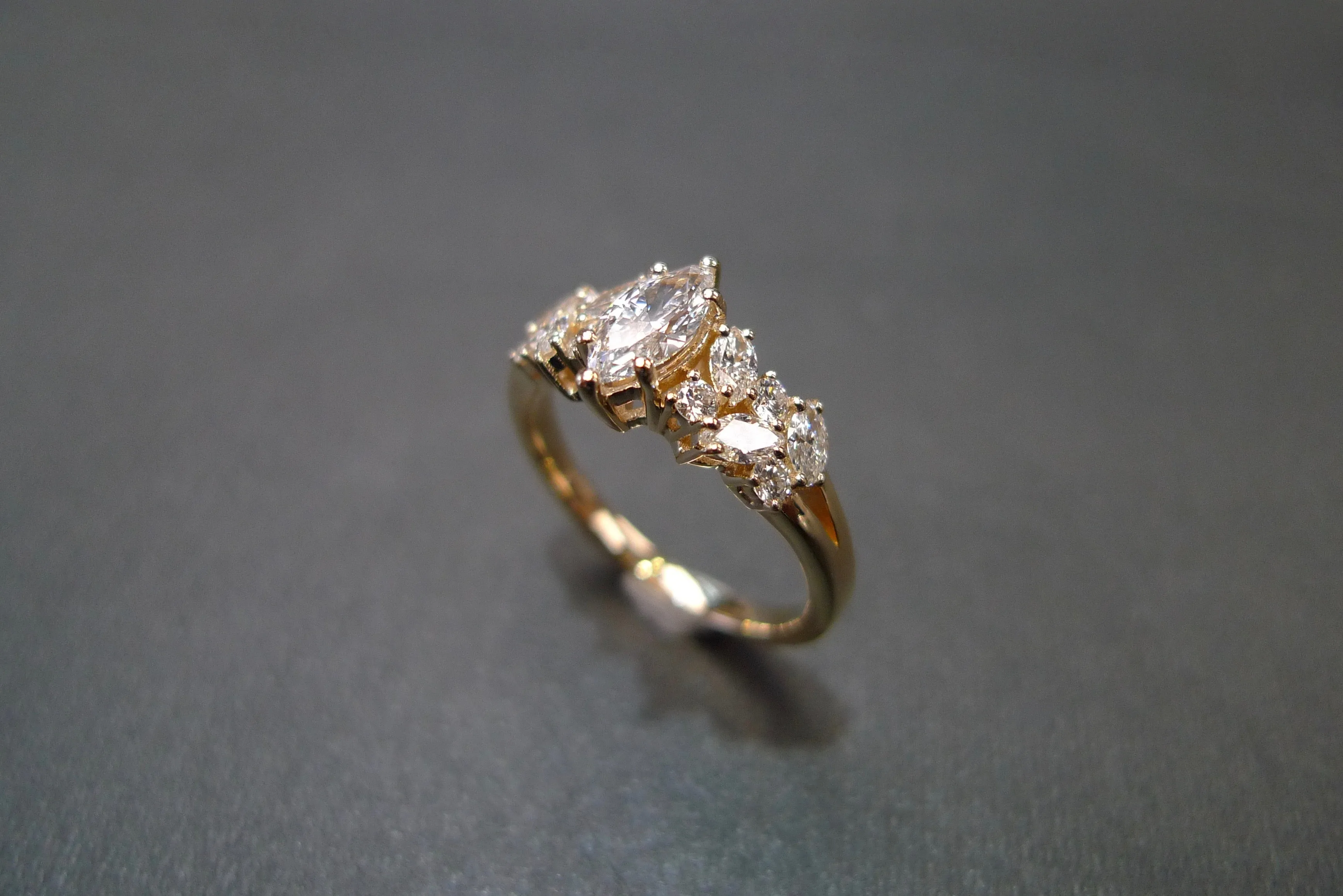 Certified 0.30ct Marquise Cut Diamond and Round Brilliant Cut Diamond Ring in Yellow Gold