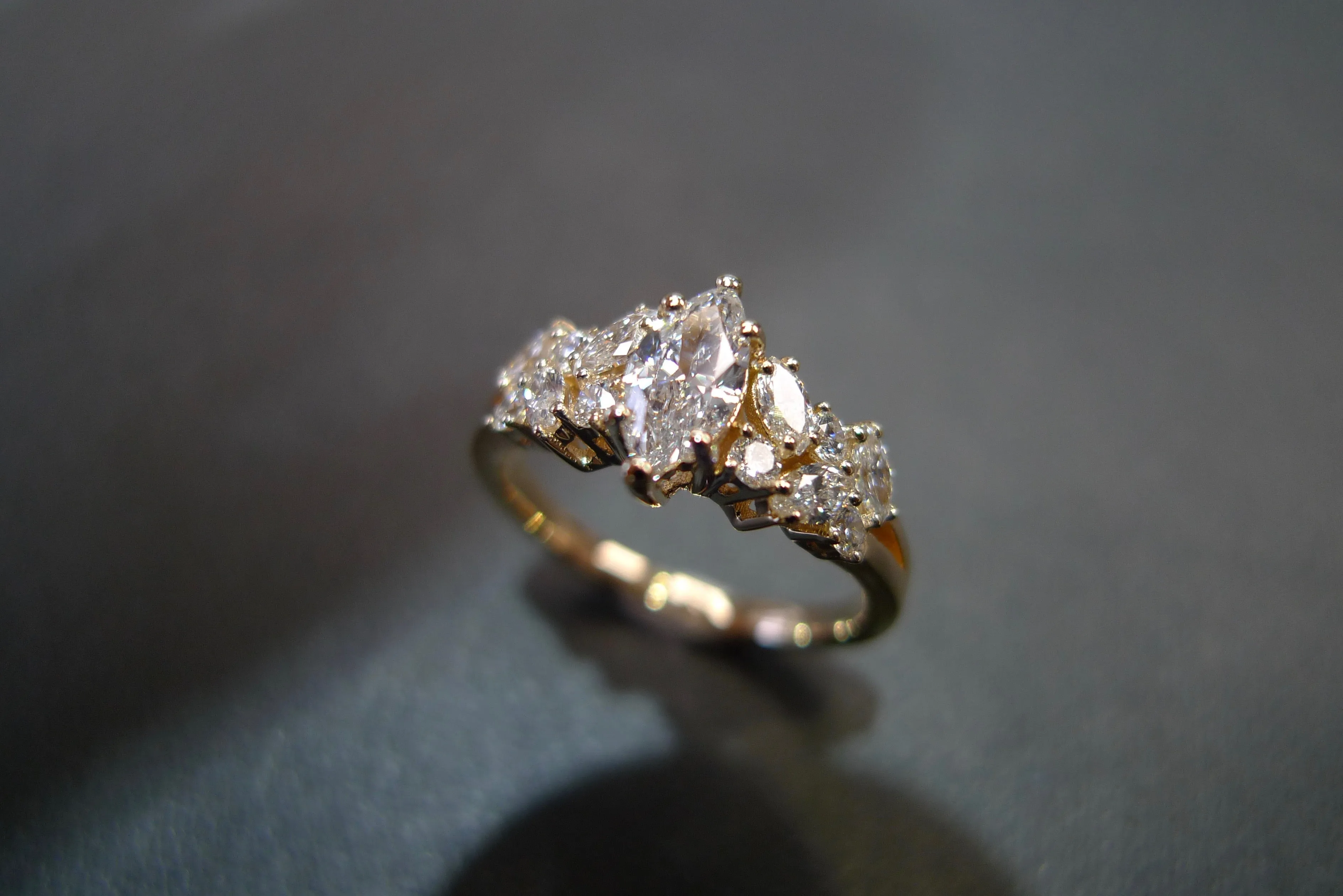 Certified 0.30ct Marquise Cut Diamond and Round Brilliant Cut Diamond Ring in Yellow Gold