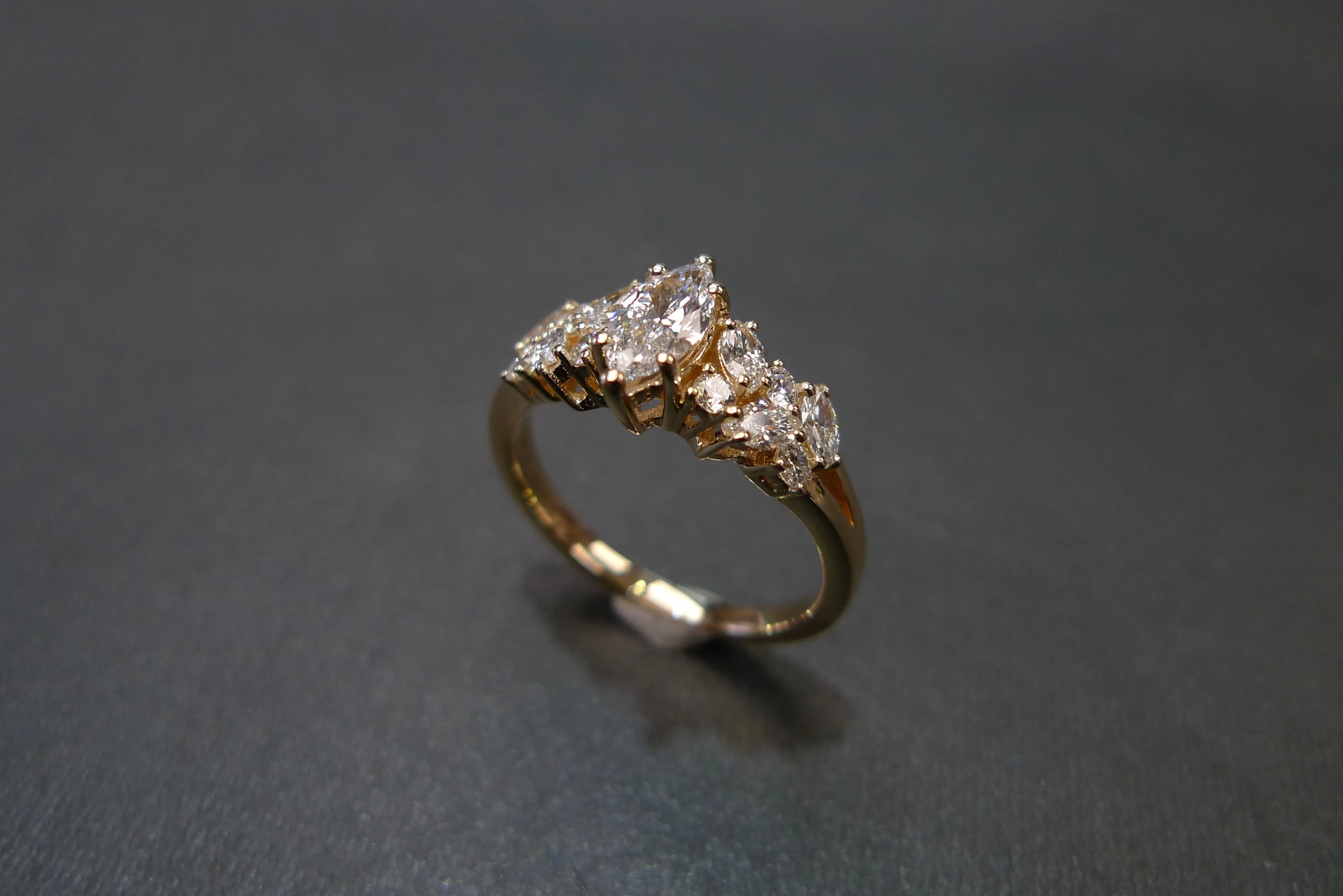 Certified 0.30ct Marquise Cut Diamond and Round Brilliant Cut Diamond Ring in Yellow Gold