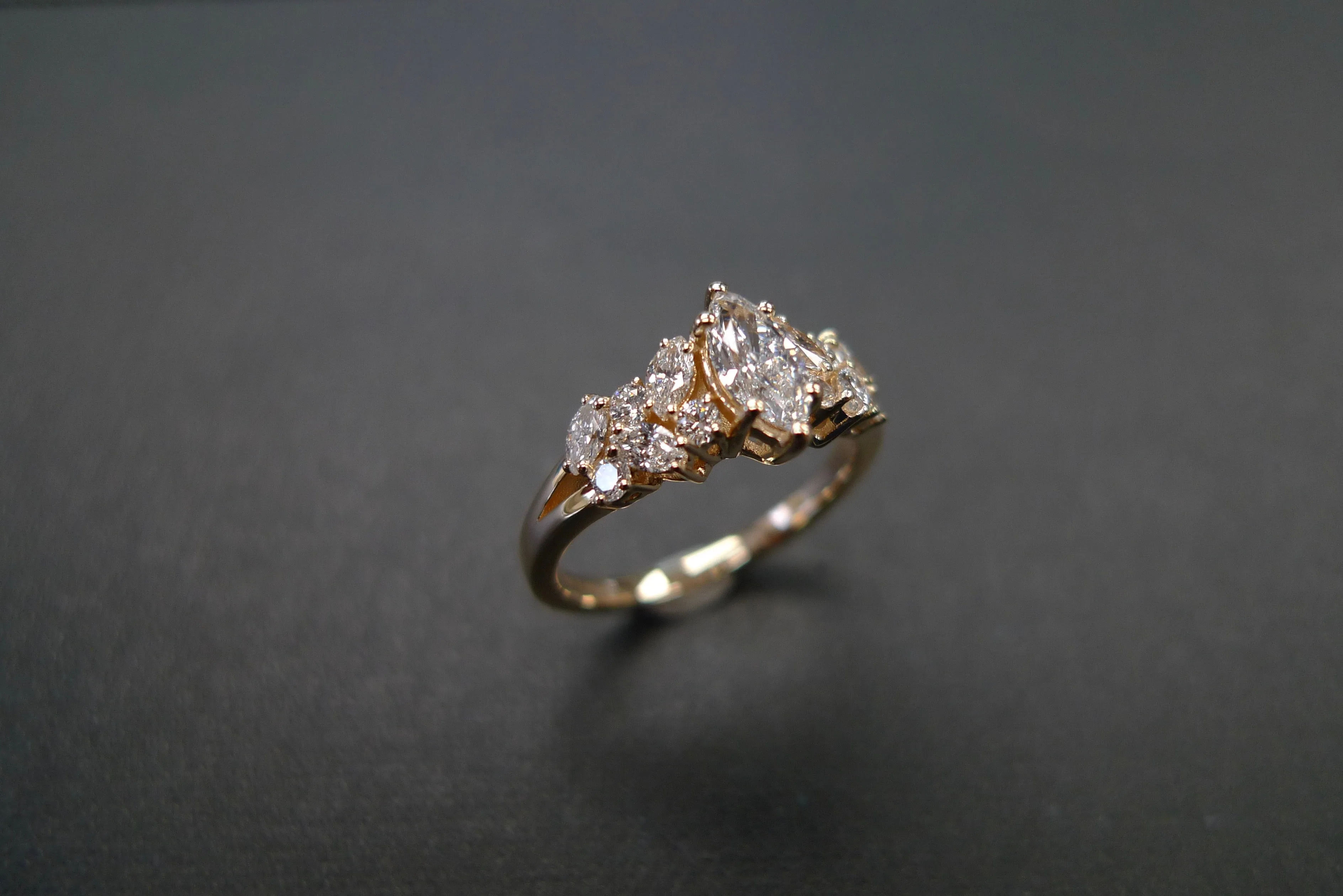 Certified 0.30ct Marquise Cut Diamond and Round Brilliant Cut Diamond Ring in Yellow Gold