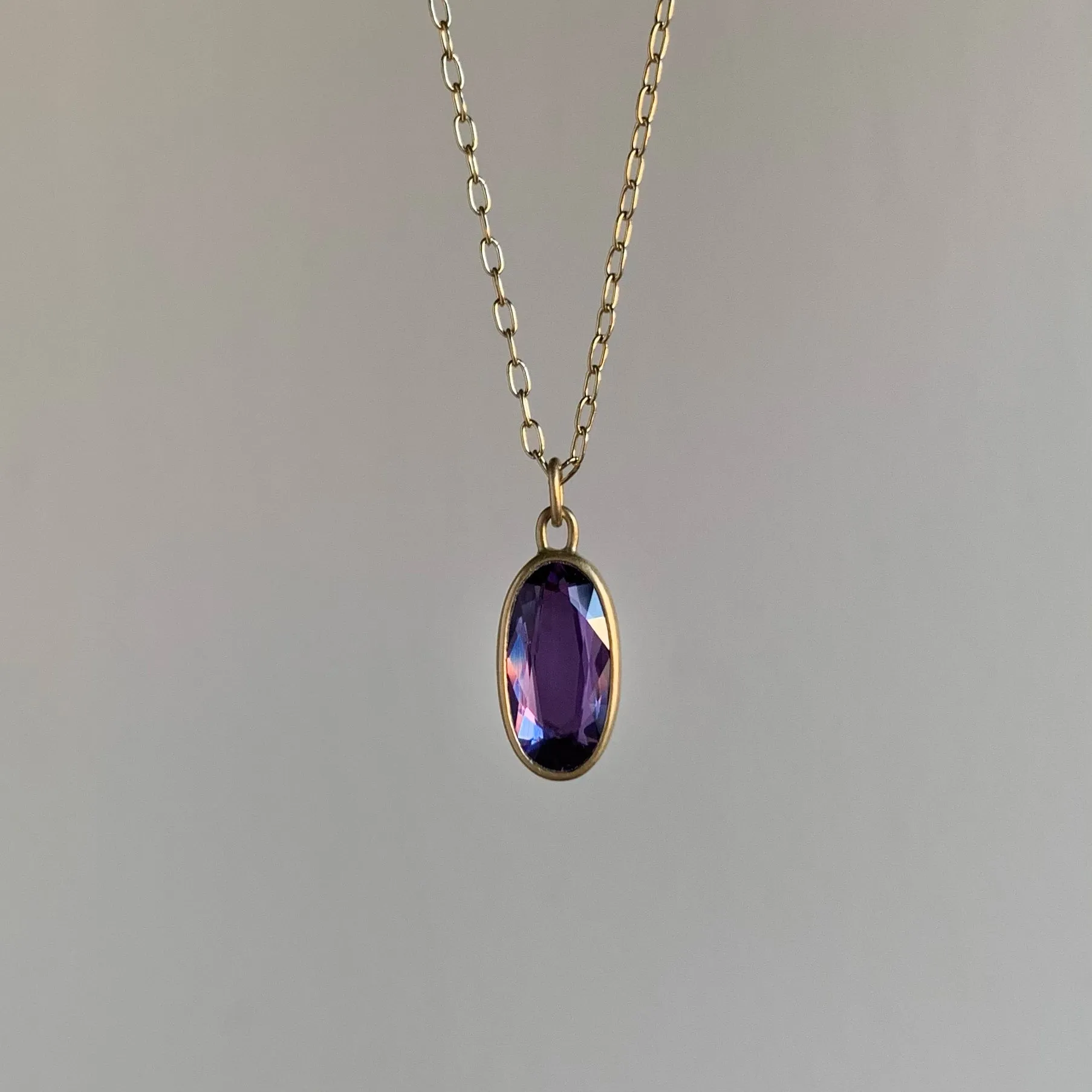 Elongated Oval Purple Sapphire Sequin Pendant