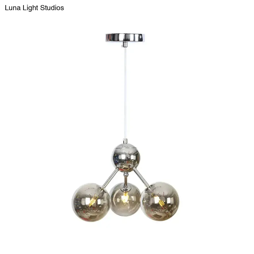 Industrial Style Hanging Chandelier Light - 13"/27.5"/34" W Orbit Shade - Amber/Clear/Smoke Gray Glass - 3/9/12 Lights