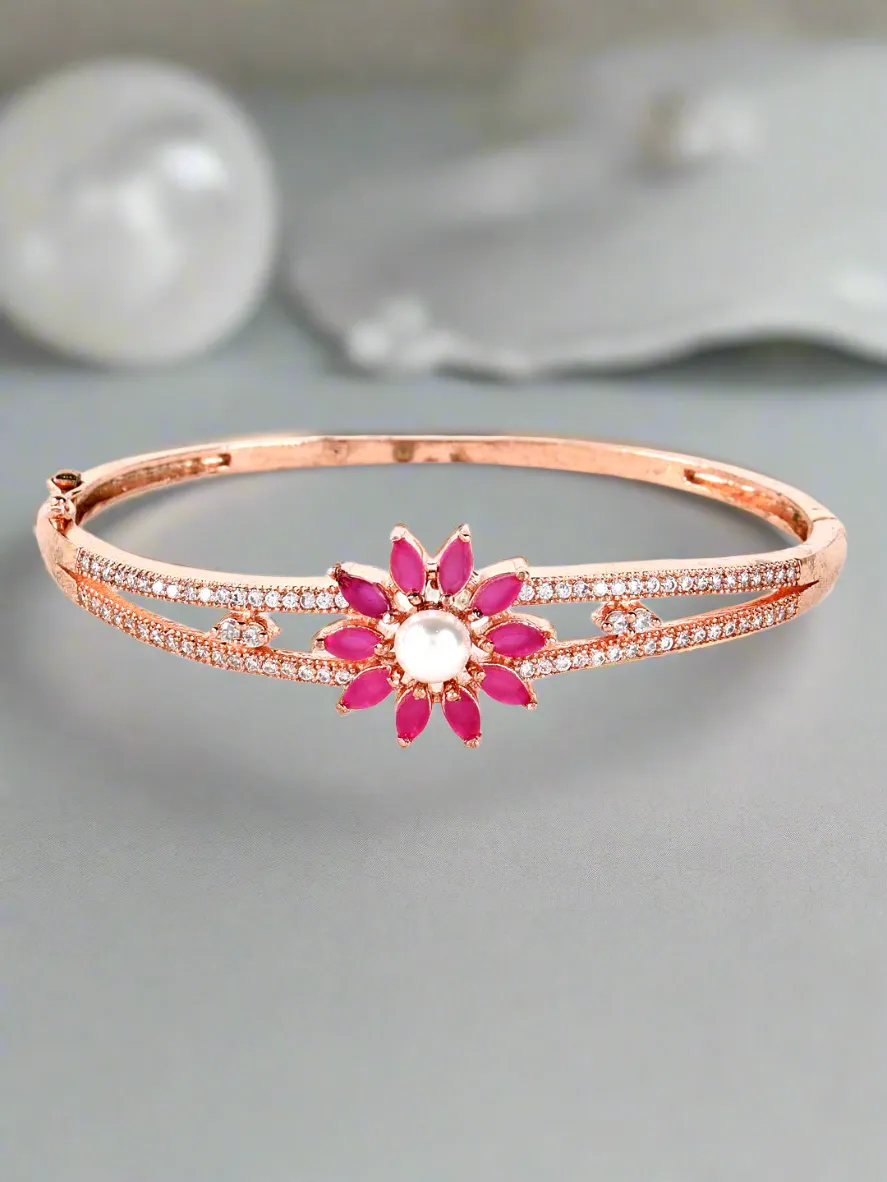 Jazz And Sizzle Rose Gold Plated American Diamond Ruby Studded Floral Patterned Bracelet