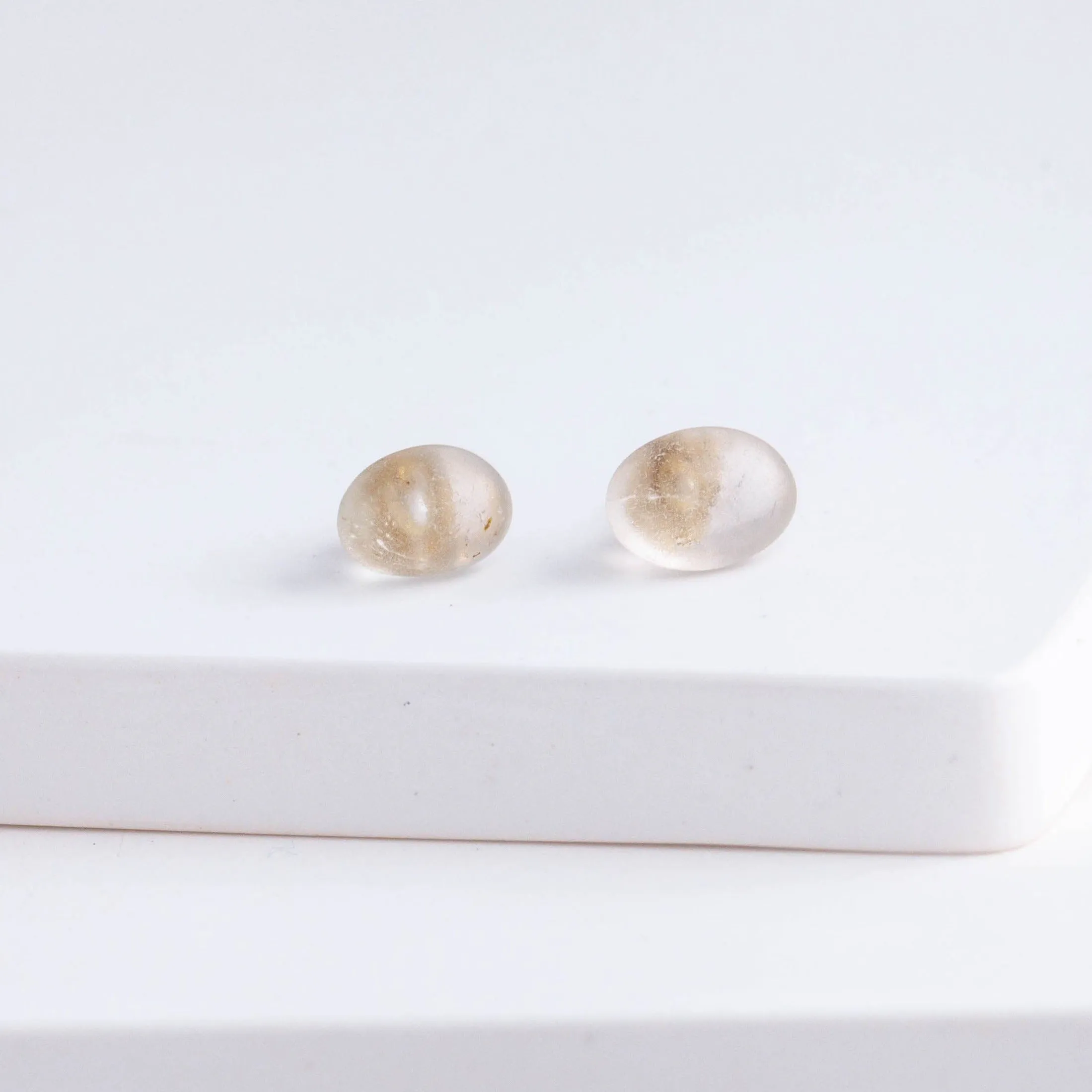 Rough stone topaz pebble stud